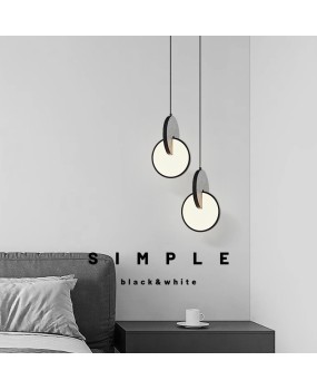 Italian minimalist high-end bedroom headboard pendant light, Nordic designer's new black hole stone bar counter bay window foyer lighting fixture