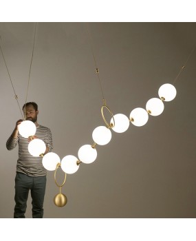 Postmodern luxury staircase pendant light Nordic designer restaurant hotel lobby glass ball necklace creative pendant light