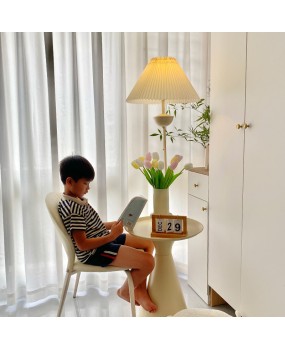 French cream style floor lamp, living room, bedroom, sofa next to a few high-end design elements, internet famous bedside table lamp