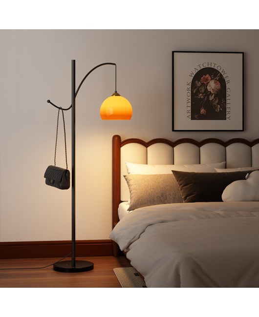 Living room floor lamp next to sofa, high-end feeling, light luxury, creative shelf, integrated study, bedroom atmosphere, fishing light