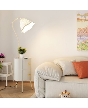 Living room sofa next to coffee table shelf floor lamp ins cream style bedroom with bedside table drawer integrated light